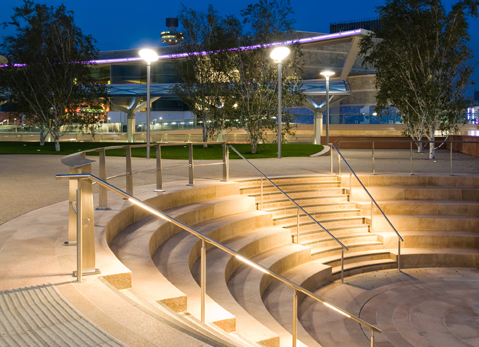 Liverpool based landscape architect designed the grand stairs - seen here glowing at night.