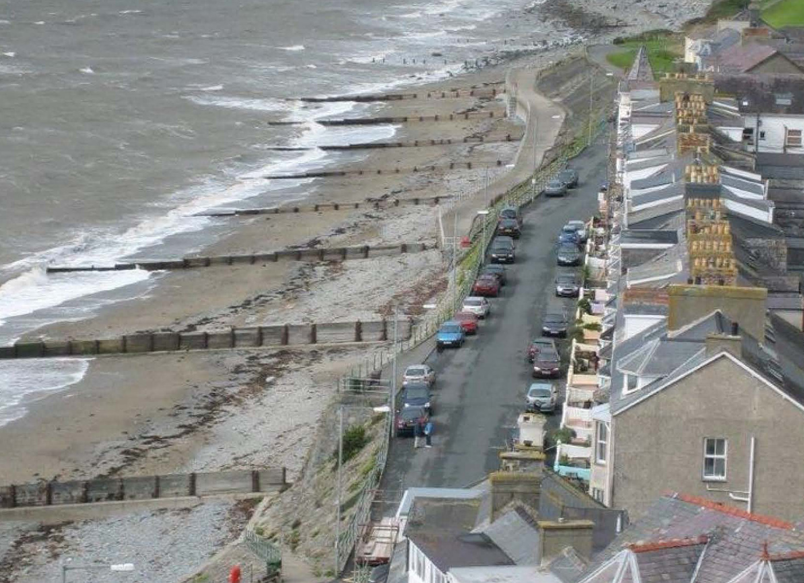 Timber groynes break up the expanse of sand in a rhythmic way
